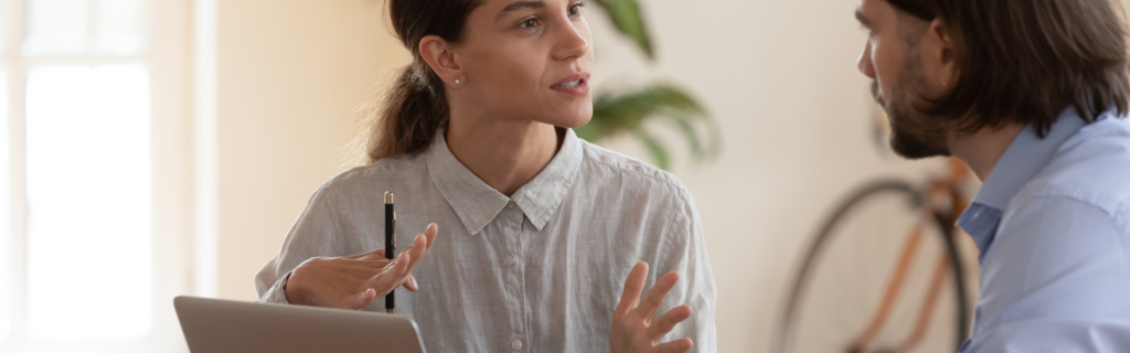 Woman excited to be working with her coach and achieving the success she desires by taking action. 