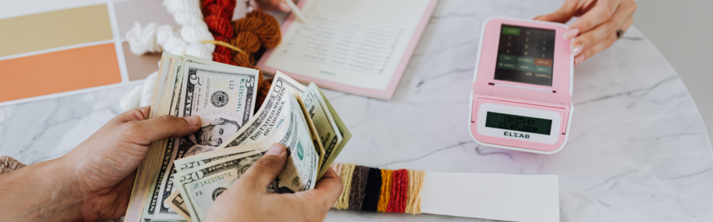 A scale with dollar bills on one side and clients on the other, with the client side outweighing the money side. The scale is titled "Scaling Your Business to Seven Figures" and the message is clear that you need to balance clients with revenue