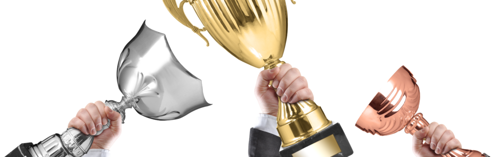 Use an image of someone holding a trophy or certificate to represent the idea of establishing oneself as an expert. This image can convey the importance of positioning oneself as a trusted authority in the industry.
